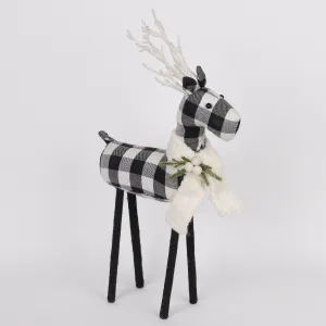 Black and white checkered 
reindeer with knitted scarf