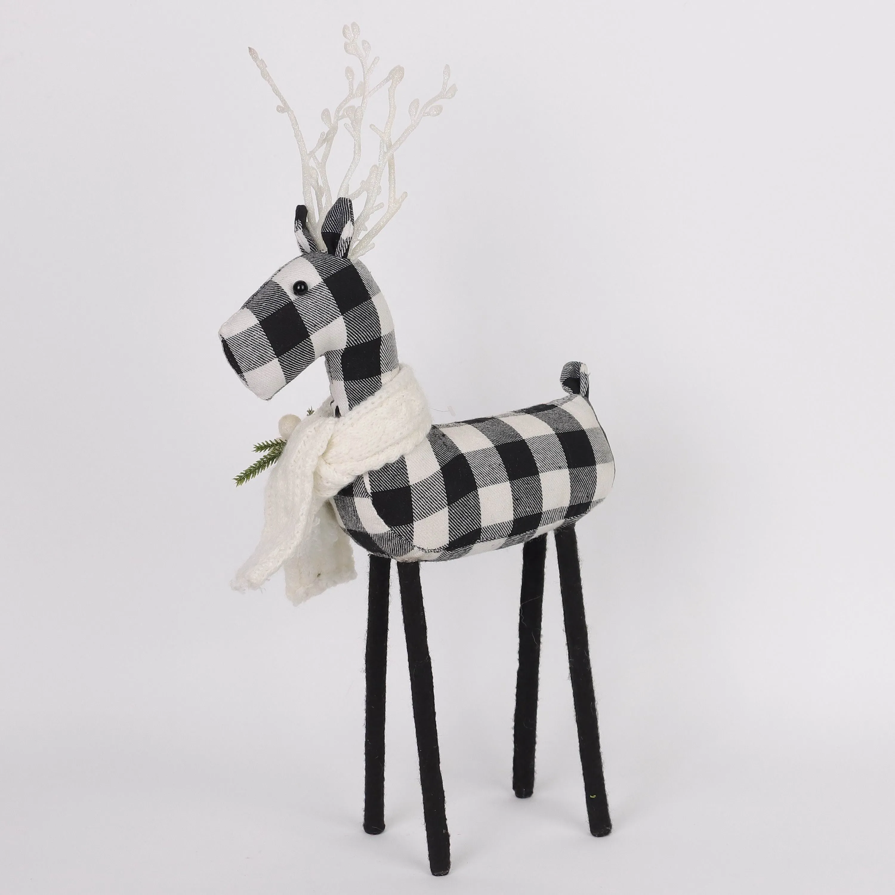 Black and white checkered 
reindeer with knitted scarf