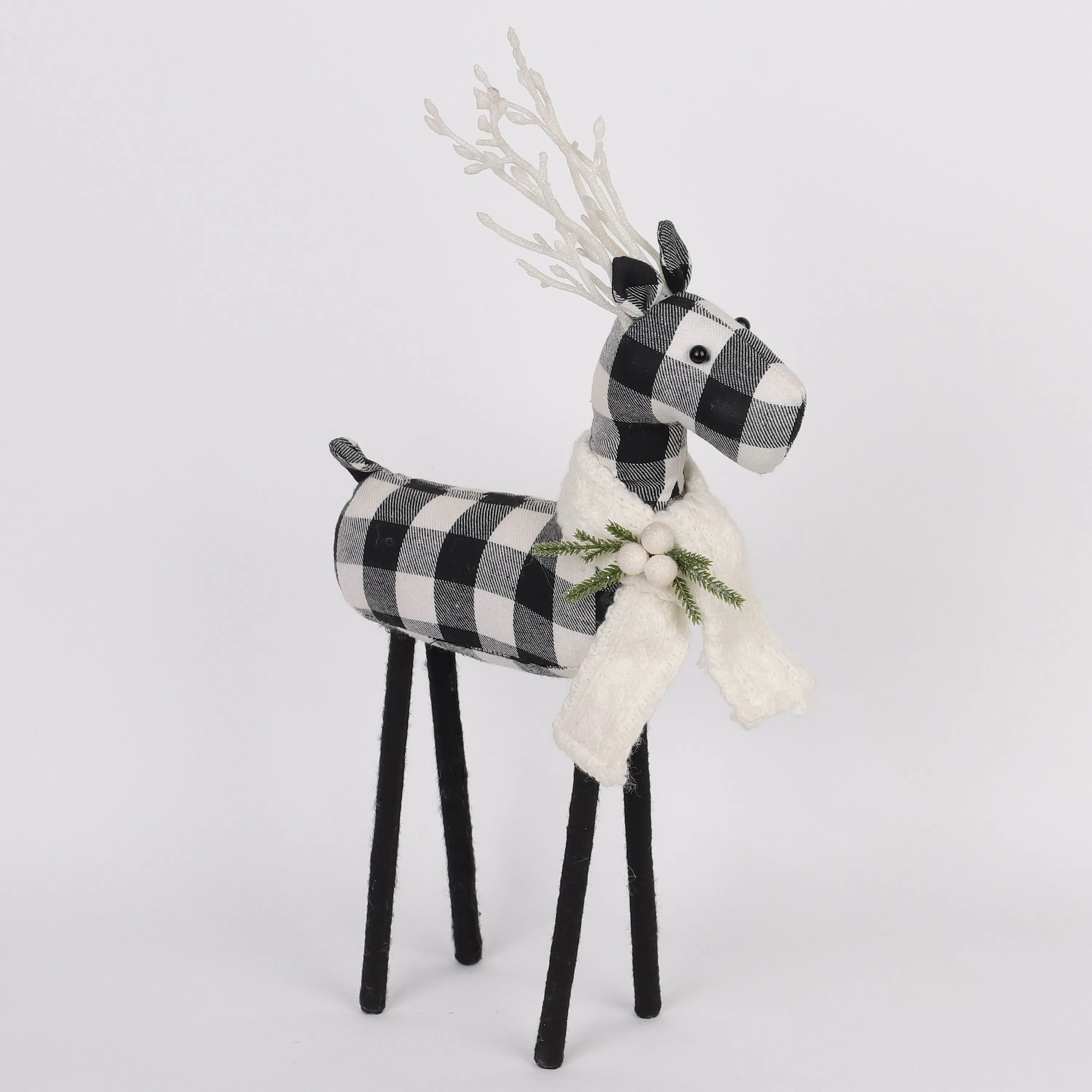 Black and white checkered 
reindeer with knitted scarf
